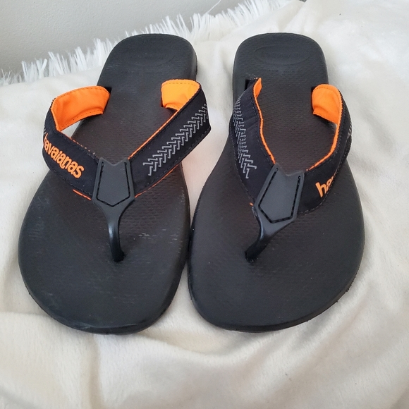 Havaianas Other - NWOT Havaianas Men's Sandles. Black and orange. Size 9/10